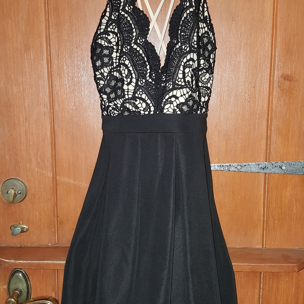 Lace black dress, with cross back strings.